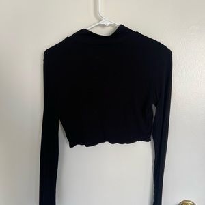 Black long sleeve with heart cutout